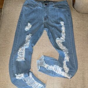 Ripped fashion jeans with pockets